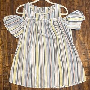 Pastel striped cold shoulder top with ruffle detail from Francesca’s.